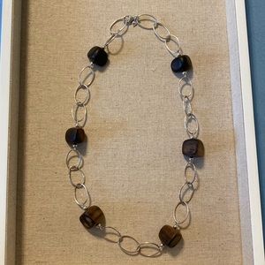 Makes a beautiful gift!
Sterling Silver links and wood beads Silpada necklace